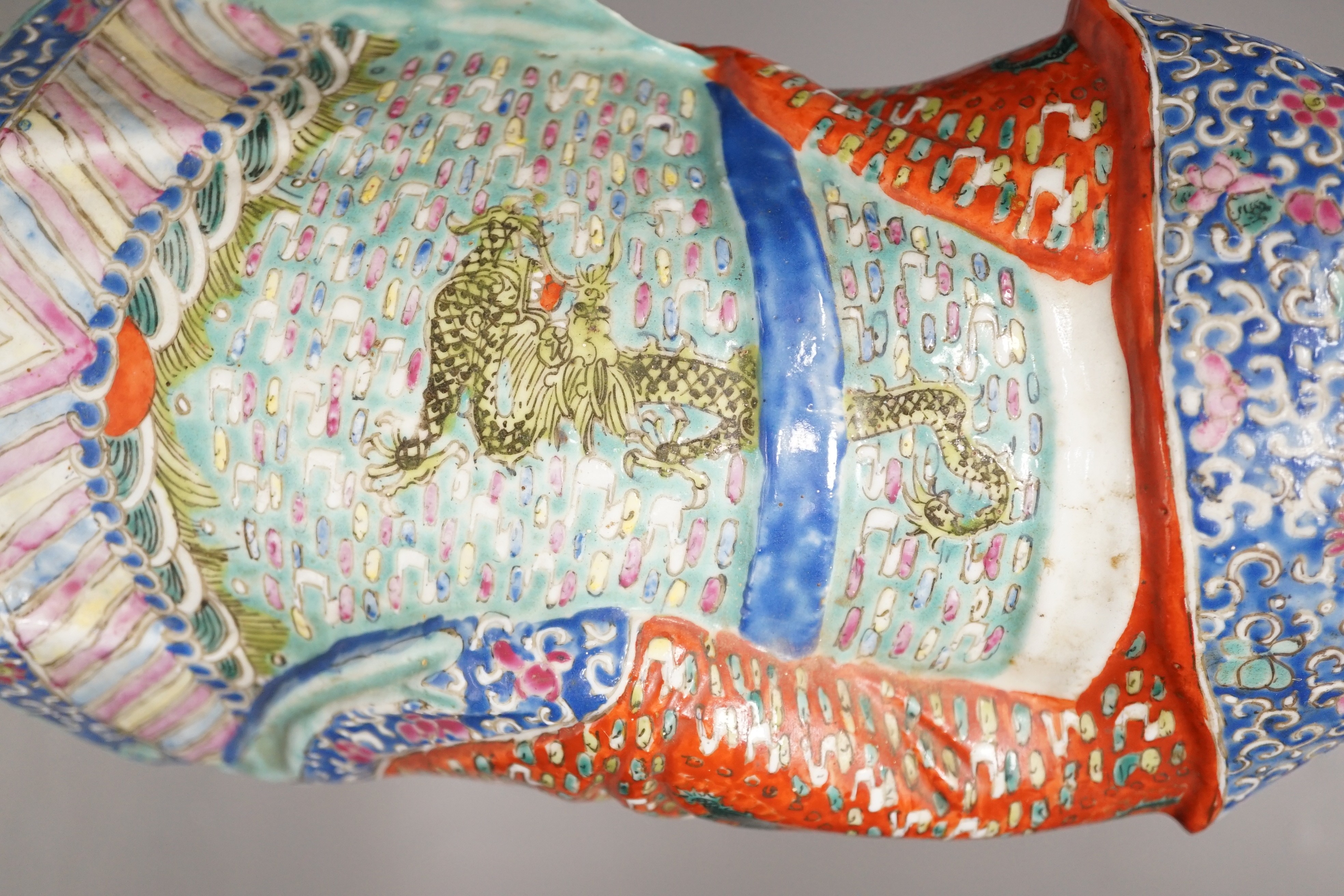 A Chinese enamelled porcelain figure of an immortal, early 20th century, 43cm